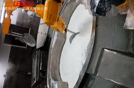 爾必地粉末自動上下料機器人作業(yè)案例